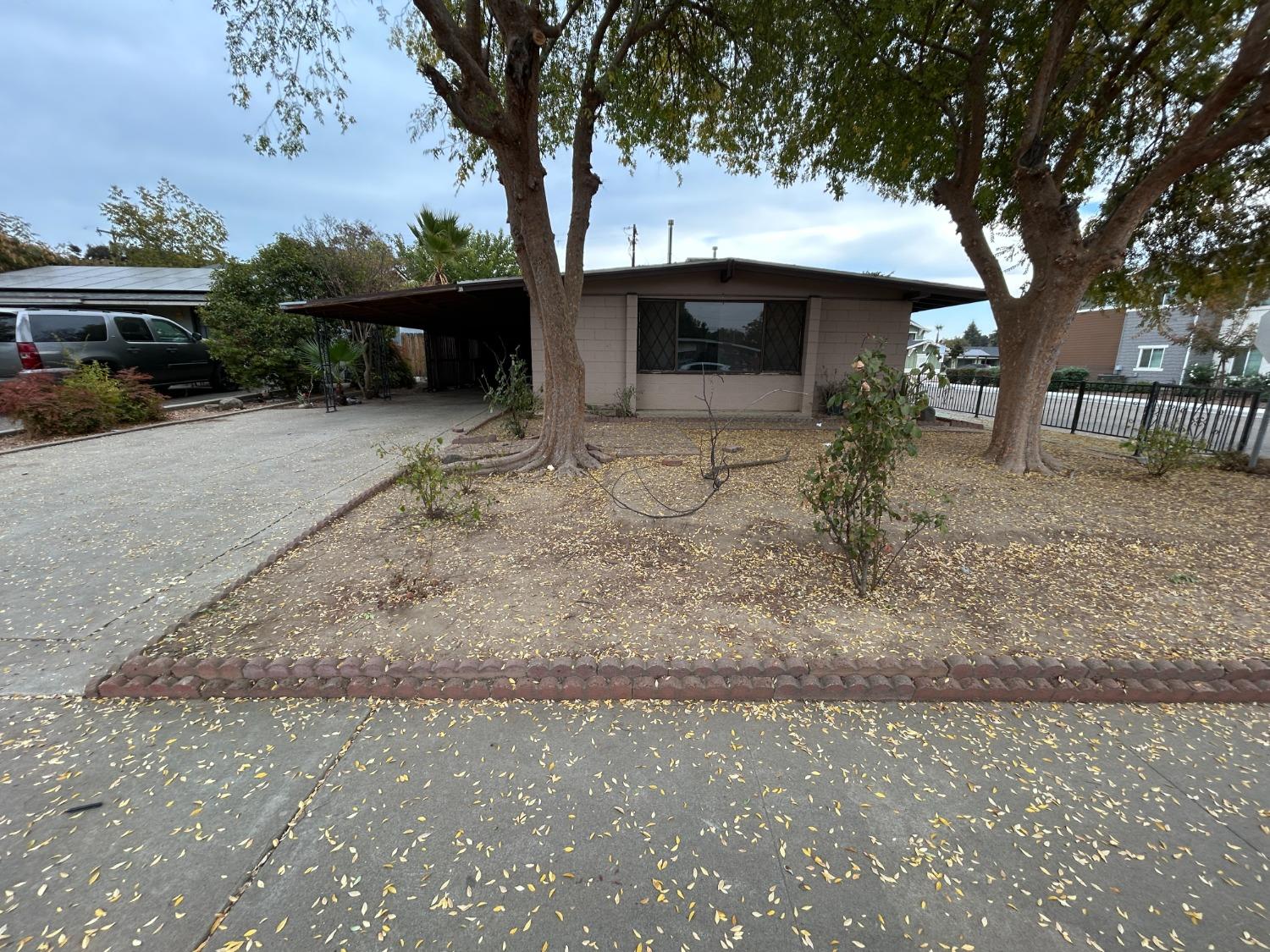 236 K Street Sanger, CA 93657 - Photo 2 of 23 a view of outdoor space yard and tree
