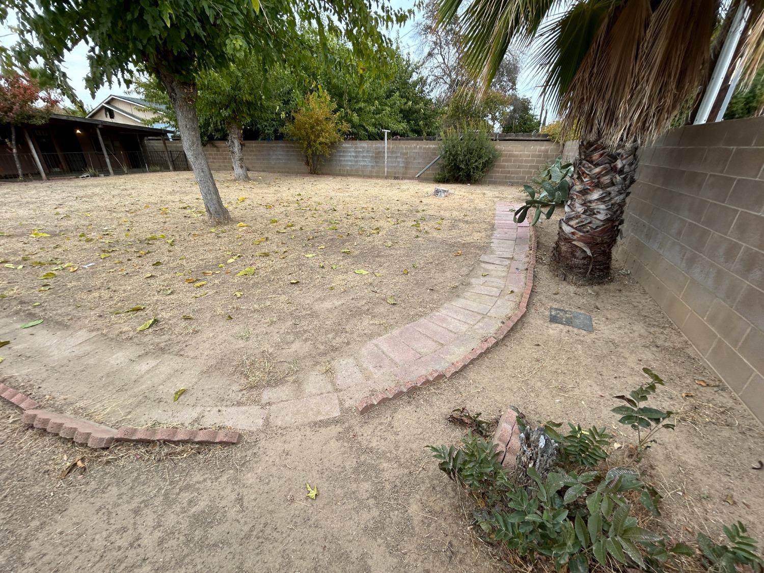 236 K Street Sanger, CA 93657 - Photo 21 of 23 a view of a backyard of the house