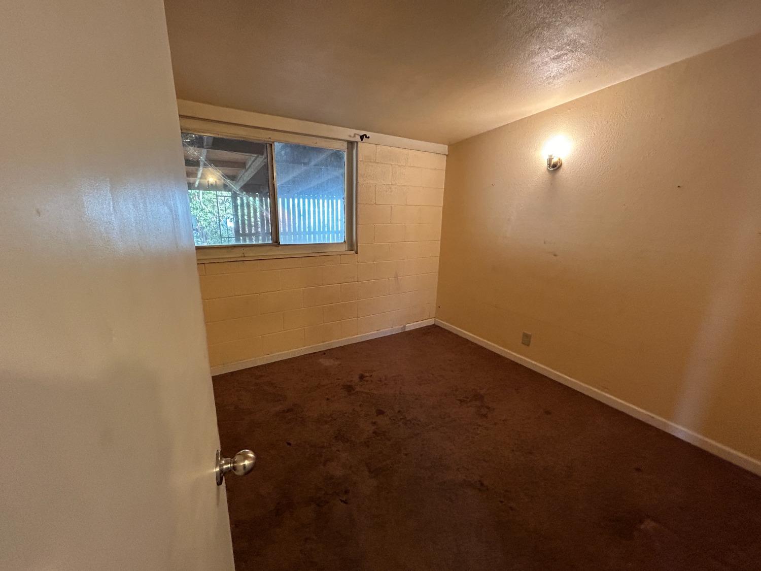 236 K Street Sanger, CA 93657 - Photo 7 of 23 an empty room with windows