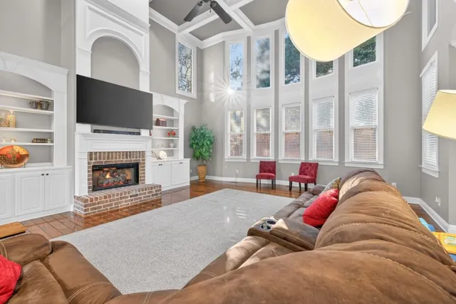 a spacious bathroom with a double vanity sink a mirror and a bathtub