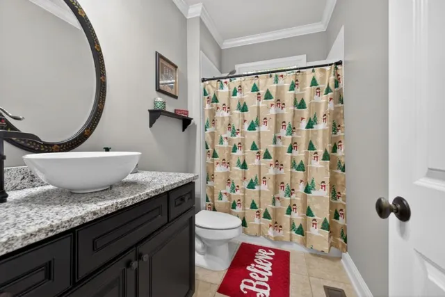 a room with gym equipment and large mirror