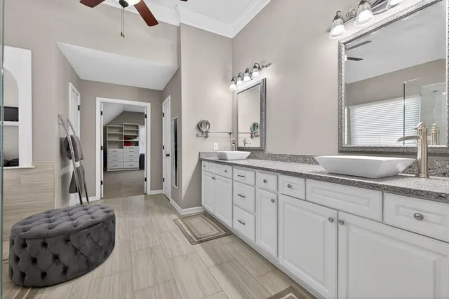 a view of a water fountain in front of the house