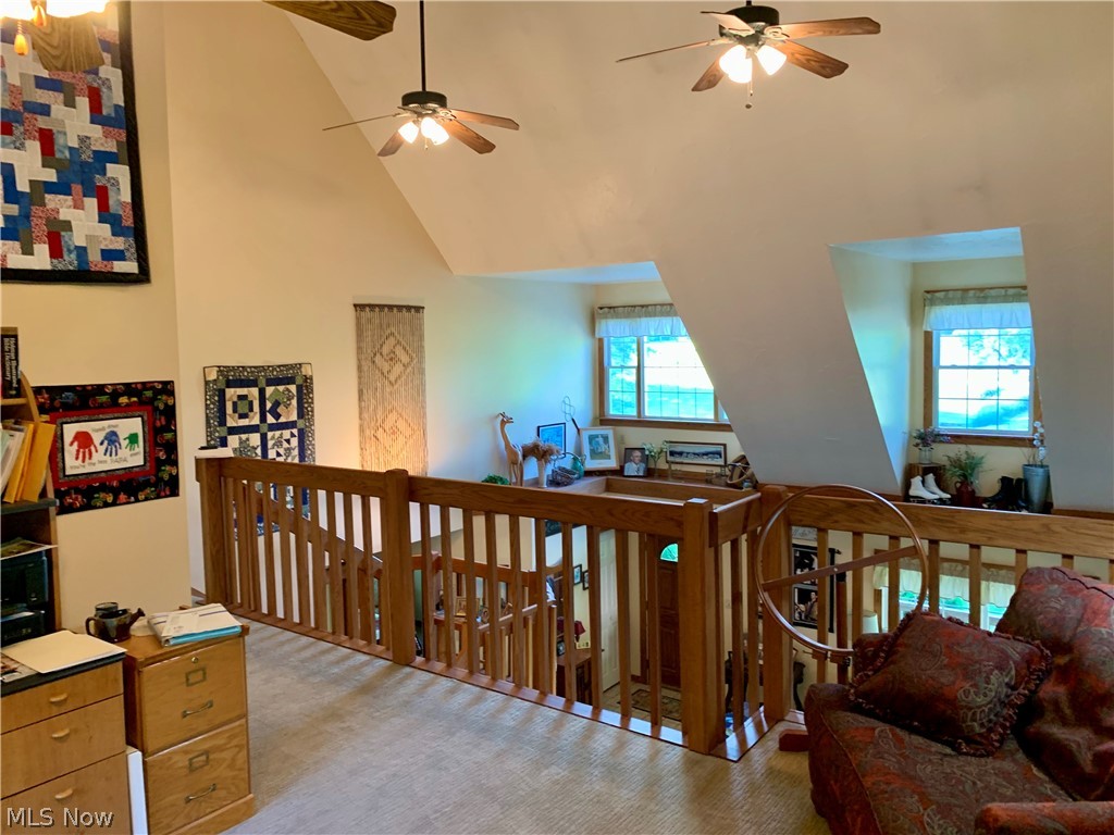 373 South Ridge Road West Conneaut, OH 44030 - Photo 26 of 50 Hall with high vaulted ceiling and carpet floors