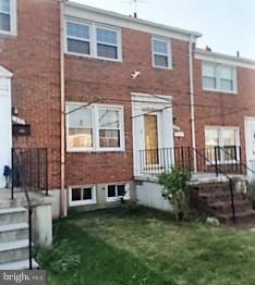 1452 Barrett Road Baltimore, MD 21207 - Photo 2 of 18 a brick building that has a lots of windows in it