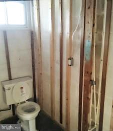 1452 Barrett Road Baltimore, MD 21207 - Photo 18 of 18 a bathroom with a toilet and a sink