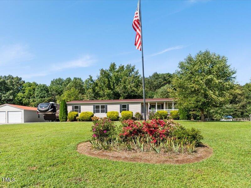 397 Seaman Road Norlina, NC 27563 - Photo 1 of 20 a front view of a house with a yard