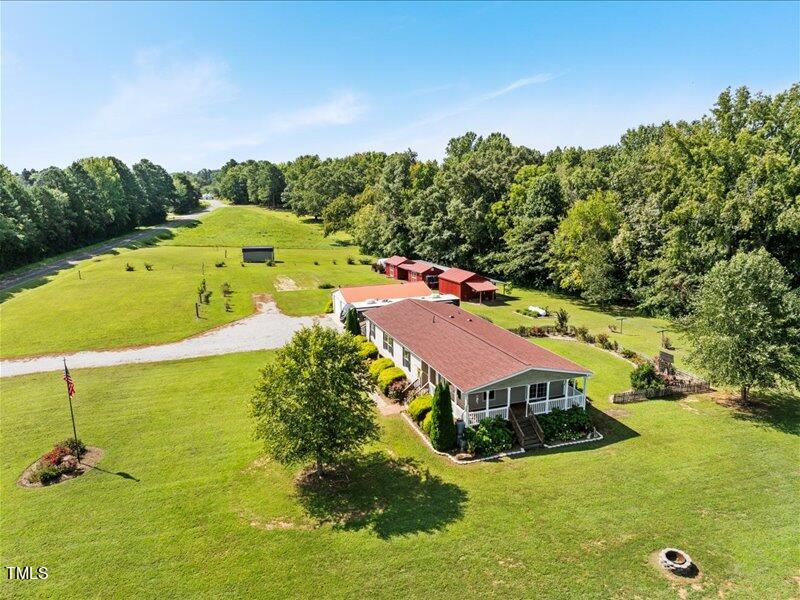 397 Seaman Road Norlina, NC 27563 - Photo 3 of 20 a view of a house with a swimming pool