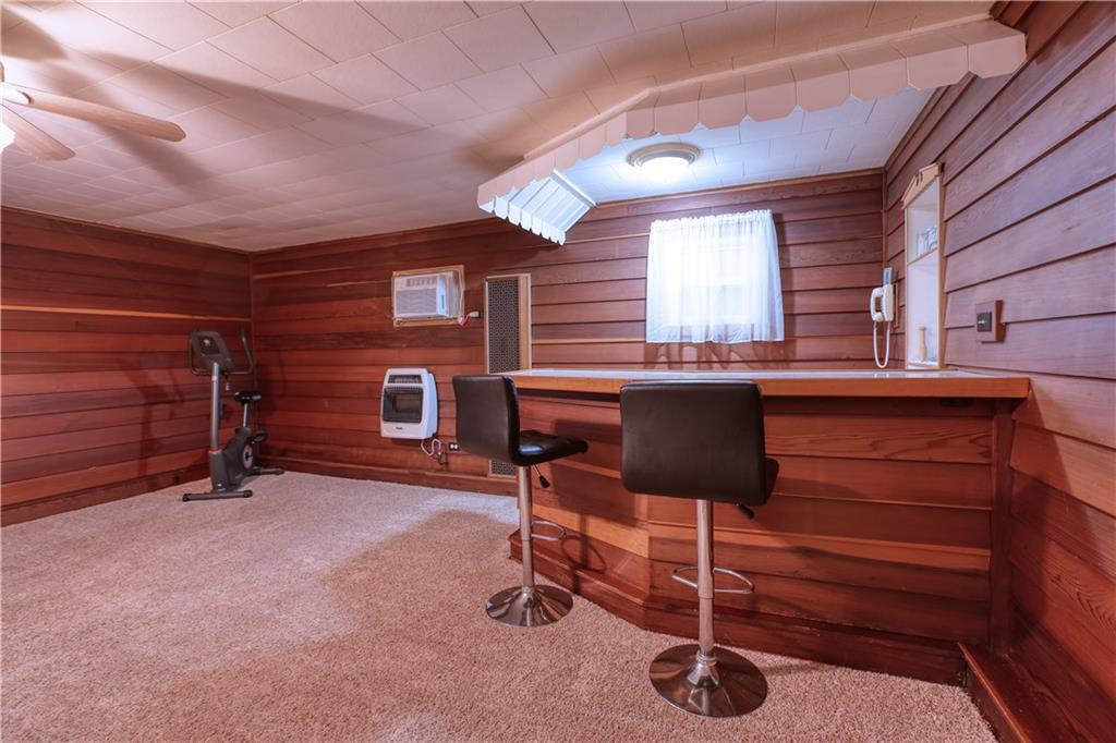 80 Chestnut Street Beaver, PA 15009 - Photo 17 of 25 The real wood walls give this room warmth and character. The built-in dry bar will be everyone's favorite spot to gather!