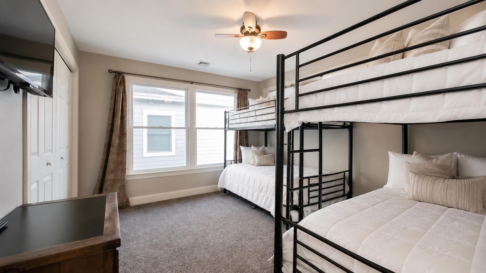 2070 West Riverside Drive Atlantic City, NJ 08401 - Photo 22 of 40 a bedroom with bed and window