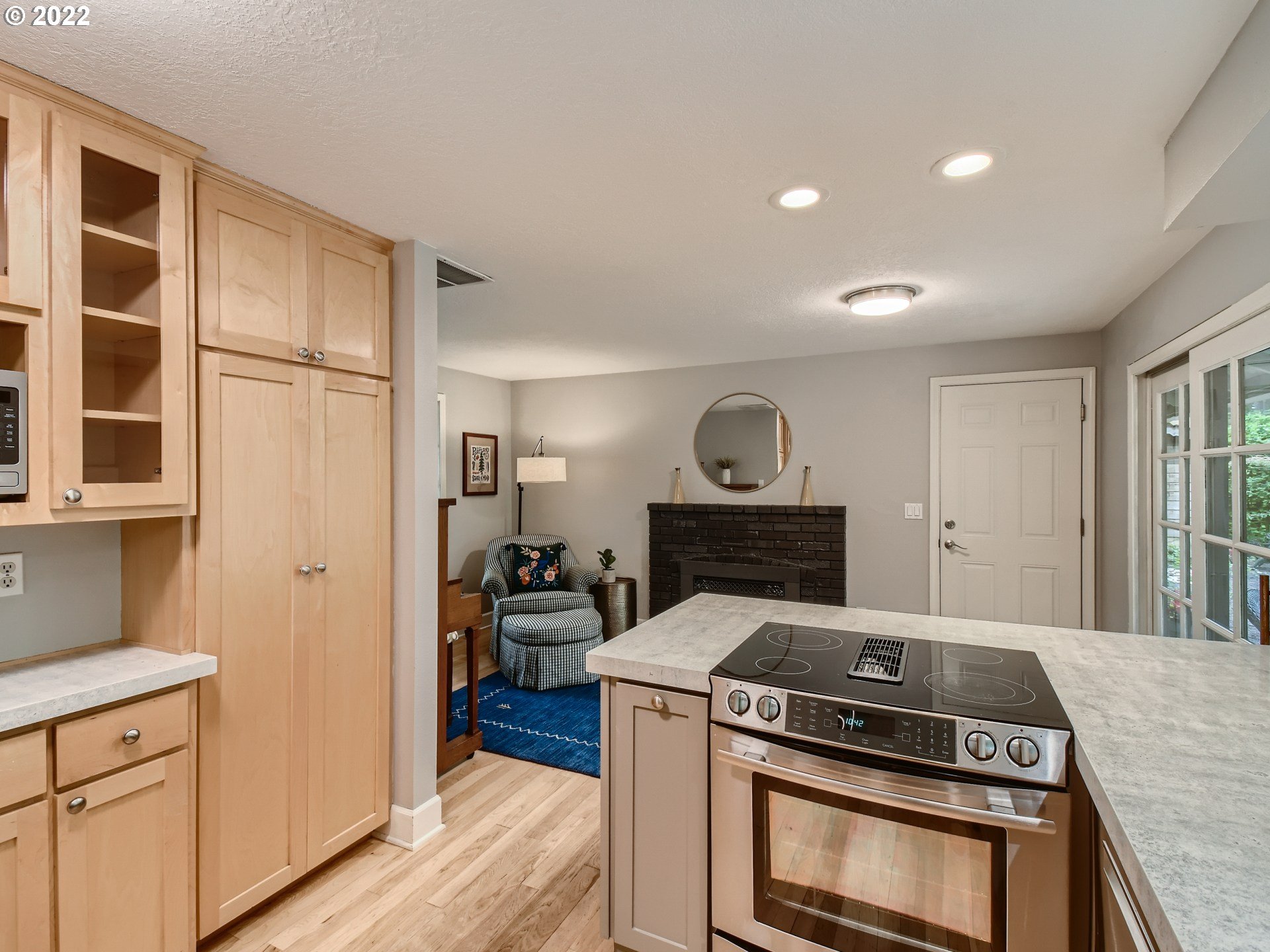 4753 Southwest Dawn Street Lake Oswego, OR 97035 - Photo 11 of 29 a kitchen with a stove and a cabinets