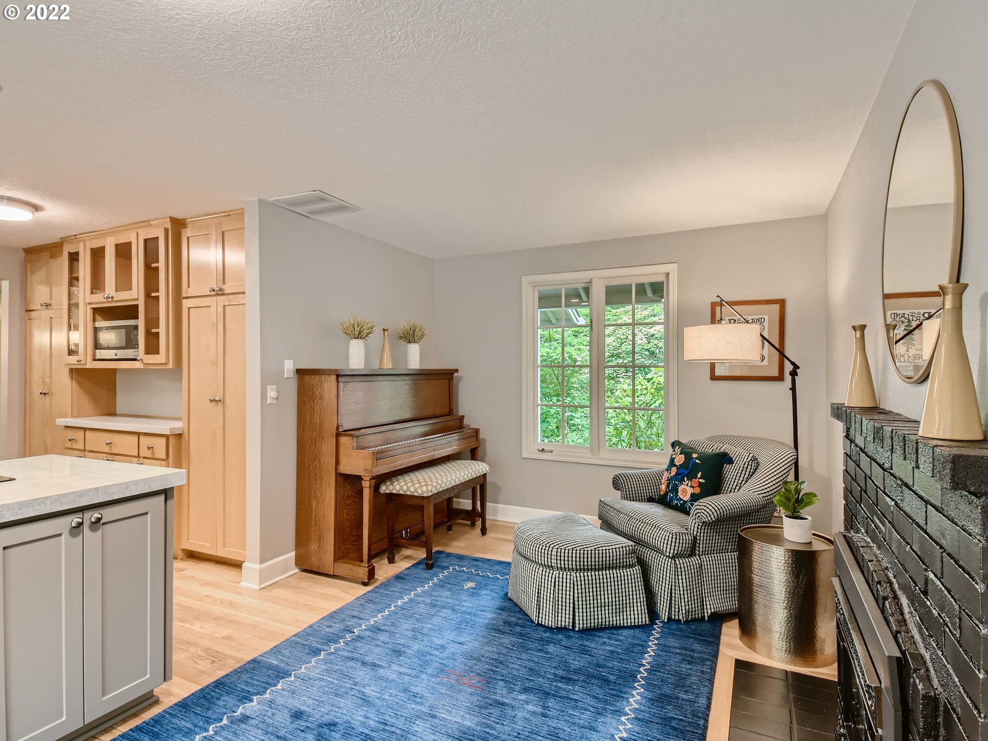 4753 Southwest Dawn Street Lake Oswego, OR 97035 - Photo 13 of 29 a living room with furniture a window and wooden floor