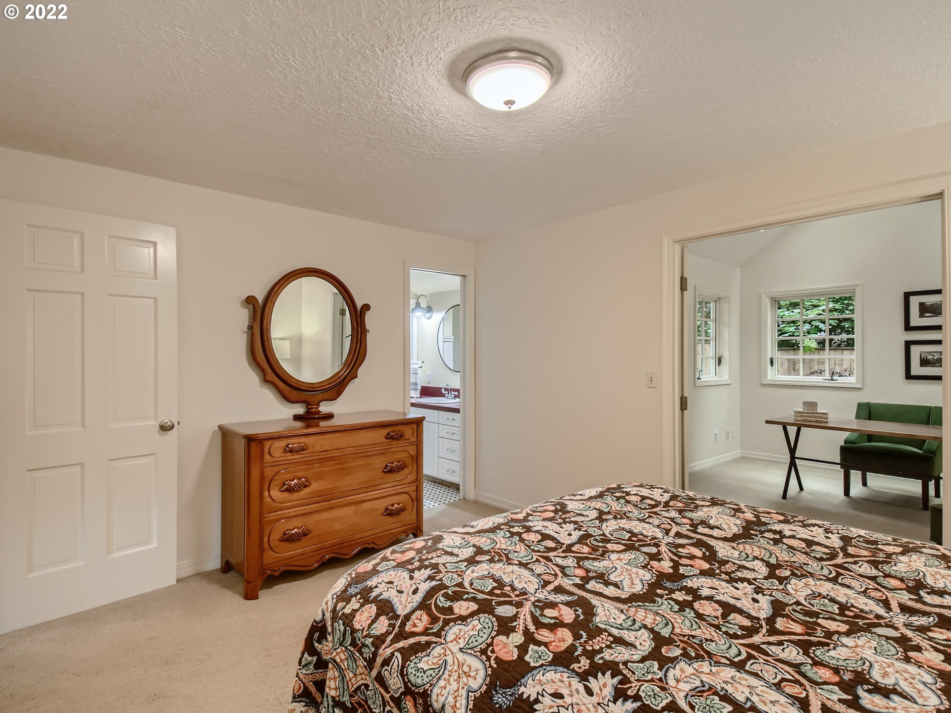 4753 Southwest Dawn Street Lake Oswego, OR 97035 - Photo 17 of 29 a bedroom with a bed closet and a window