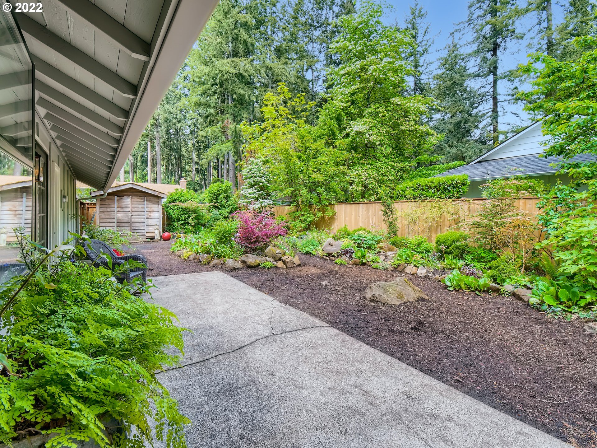 4753 Southwest Dawn Street Lake Oswego, OR 97035 - Photo 24 of 29 a view of a garden with flower plants