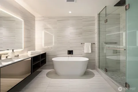 a view of a hallway with washer and dryer