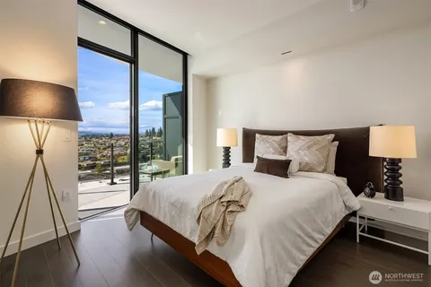a kitchen with sink and refrigerator