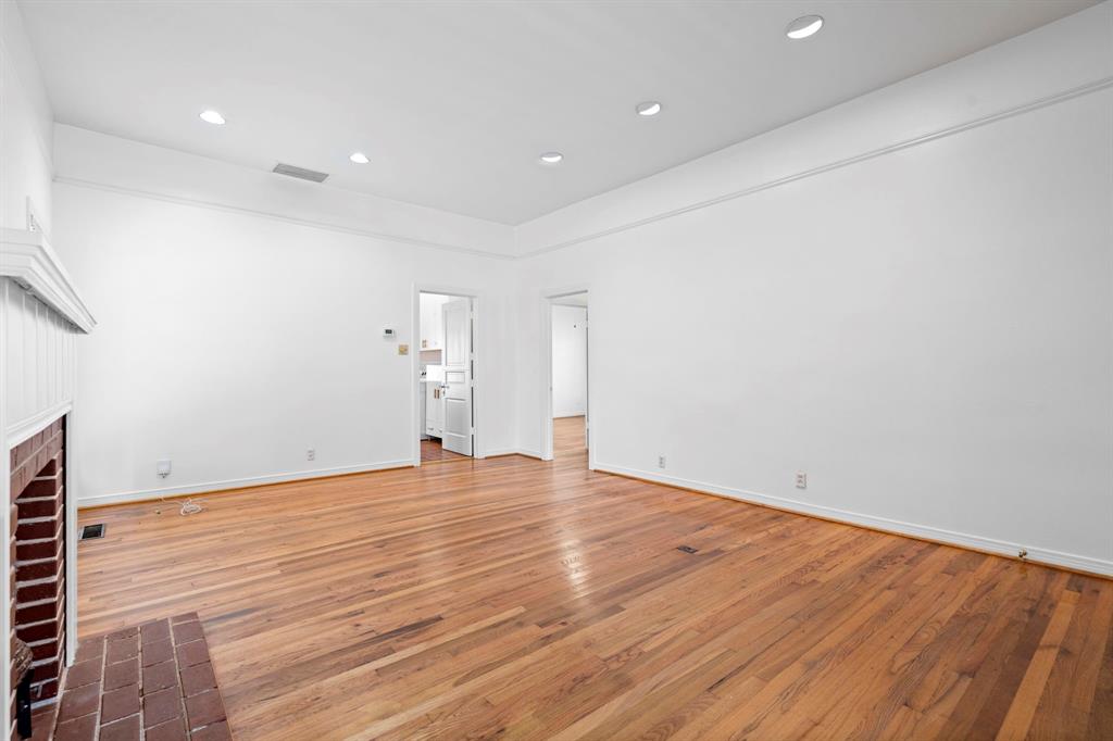4407 Bonham Street Dallas, TX 75229 - Photo 5 of 22 a view of empty room with wooden floor