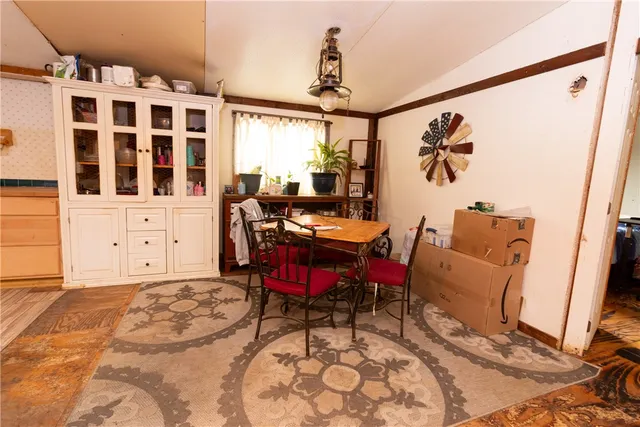 a room with furniture and a flat screen tv