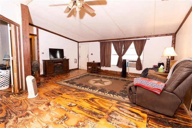 a bedroom with a bed and the table