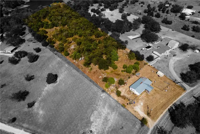 a view of lake with green space