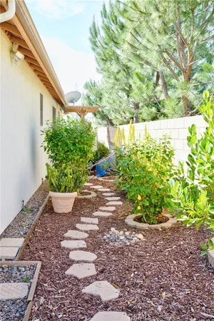 a backyard of a house with lots of green space