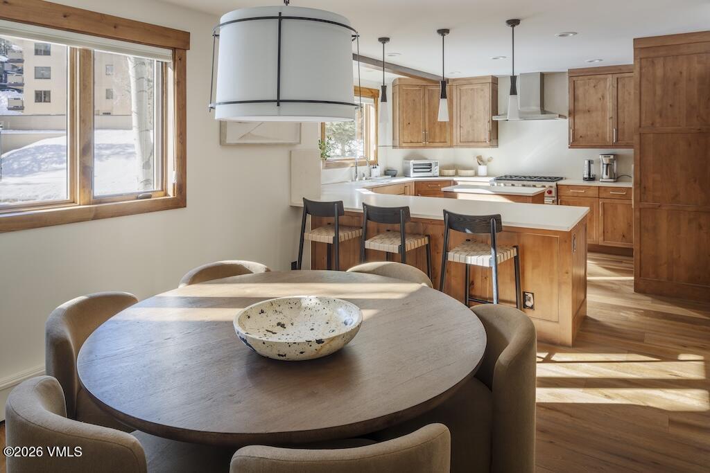 1670 Fallridge Place, Unit 9 Vail, CO 81657 - Photo 20 of 39 a view of a dining room with furniture