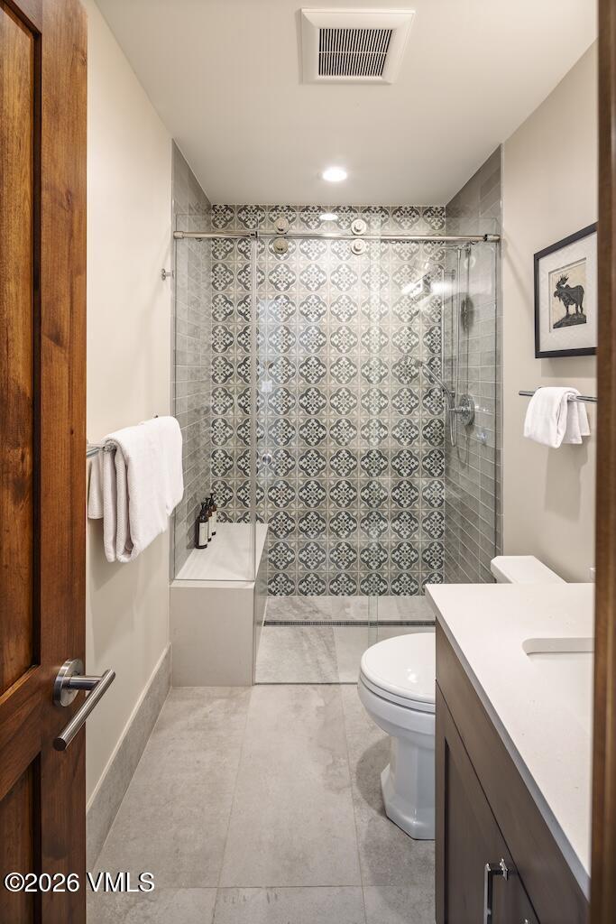 1670 Fallridge Place, Unit 9 Vail, CO 81657 - Photo 26 of 39 a bathroom with a sink toilet and shower