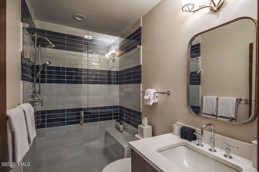 1670 Fallridge Place, Unit 9 Vail, CO 81657 - Photo 35 of 39 a bathroom with a sink toilet and shower