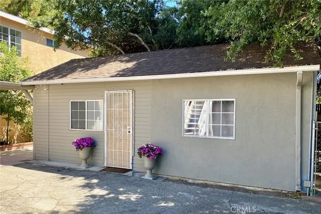 a front view of house with yard