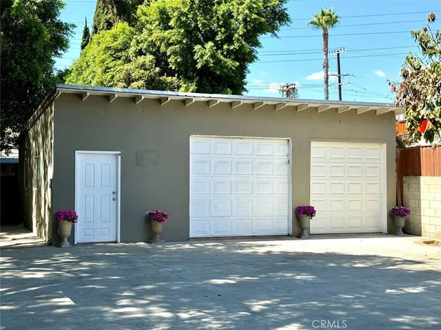 an aerial view of a house with garden