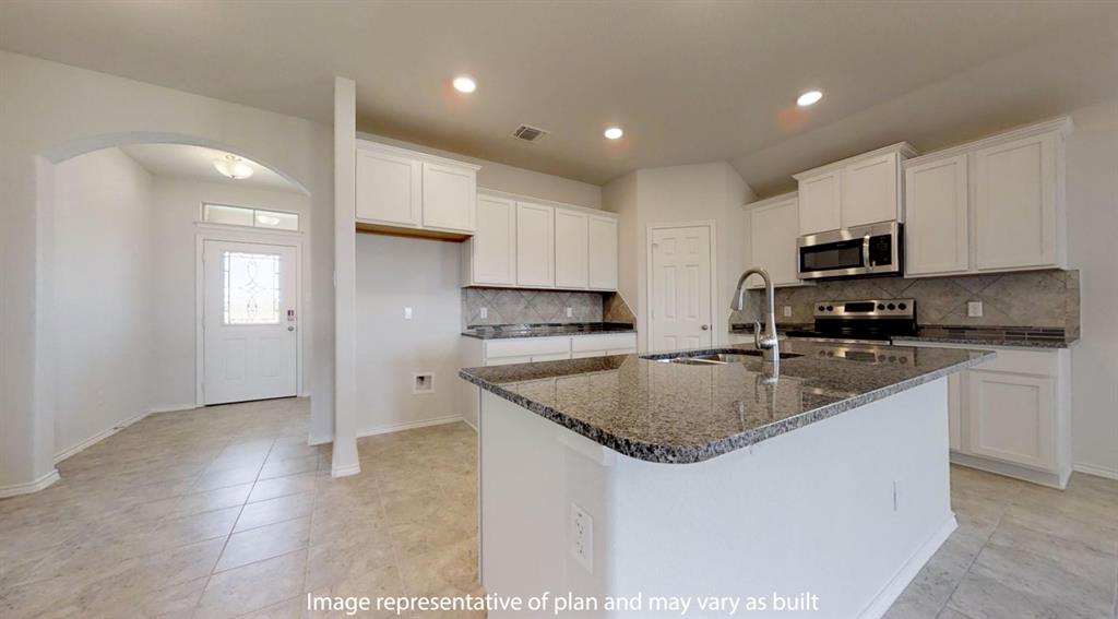 5800 Foggy Lagoon Drive Waco, TX 76708 - Photo 6 of 24 a kitchen with stainless steel appliances granite countertop a sink a stove and a refrigerator