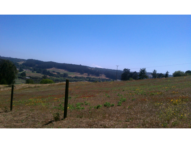 567 Pini Road Watsonville, CA 95076 - Photo 4 of 6 a view of a lake with a mountain in the background