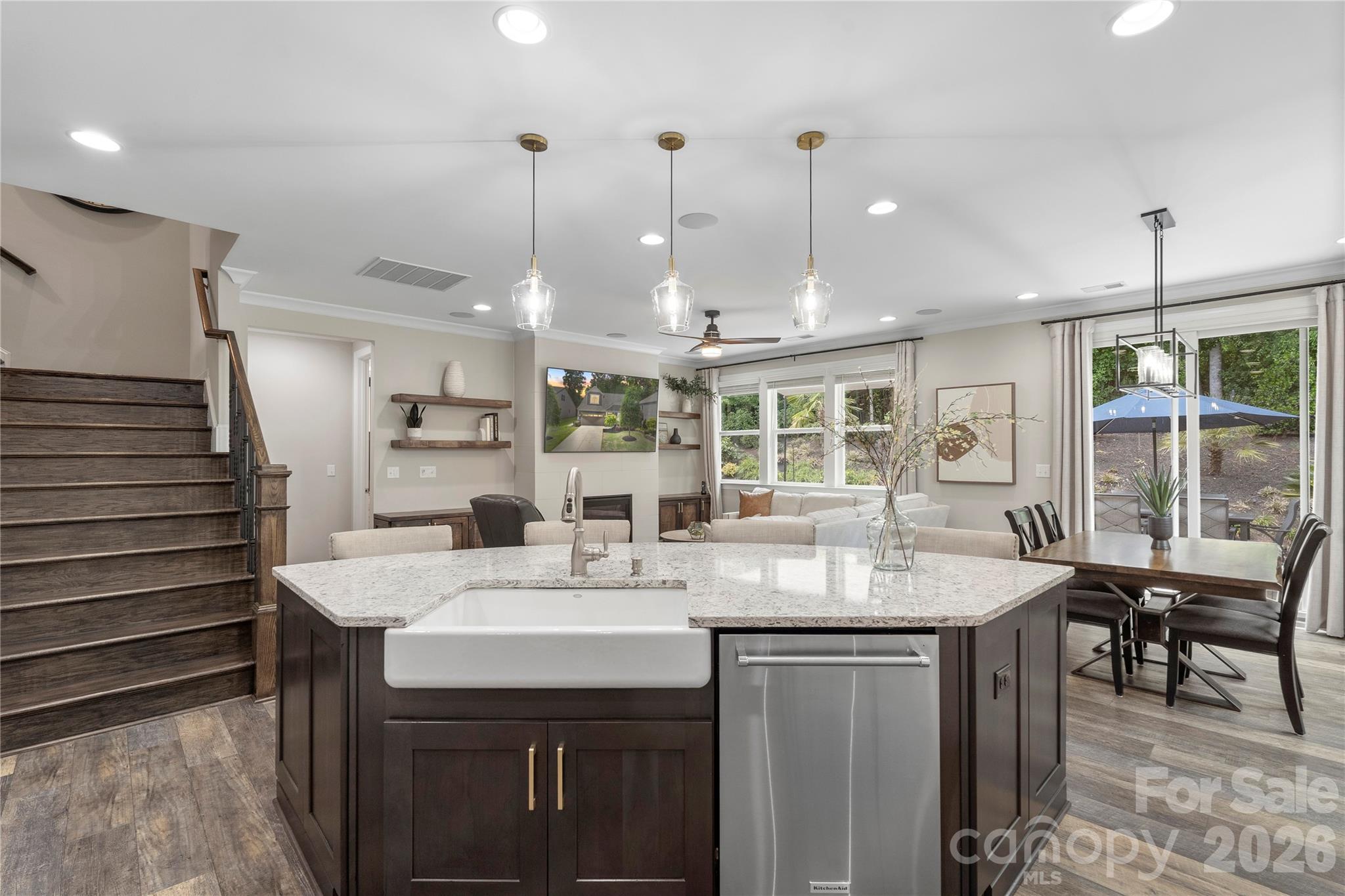 445 Sandbar Point Clover, SC 29710 - Photo 13 of 48 a kitchen with granite countertop a sink and a refrigerator