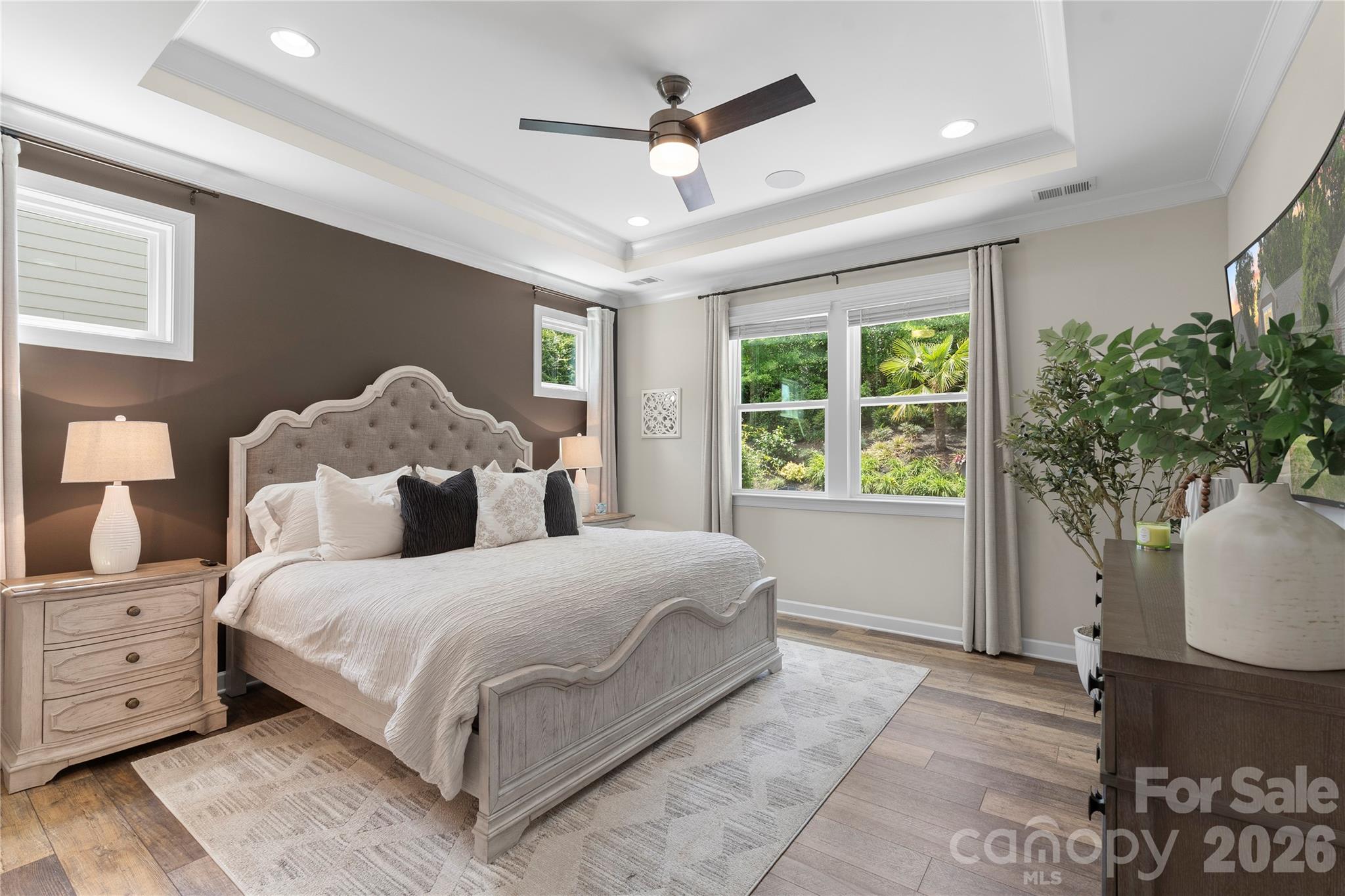 445 Sandbar Point Clover, SC 29710 - Photo 22 of 48 a bedroom with a large bed and a potted plant