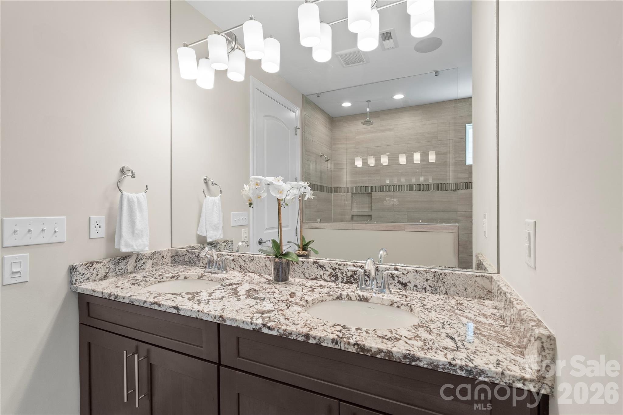 445 Sandbar Point Clover, SC 29710 - Photo 28 of 48 a bathroom with a sink and a mirror