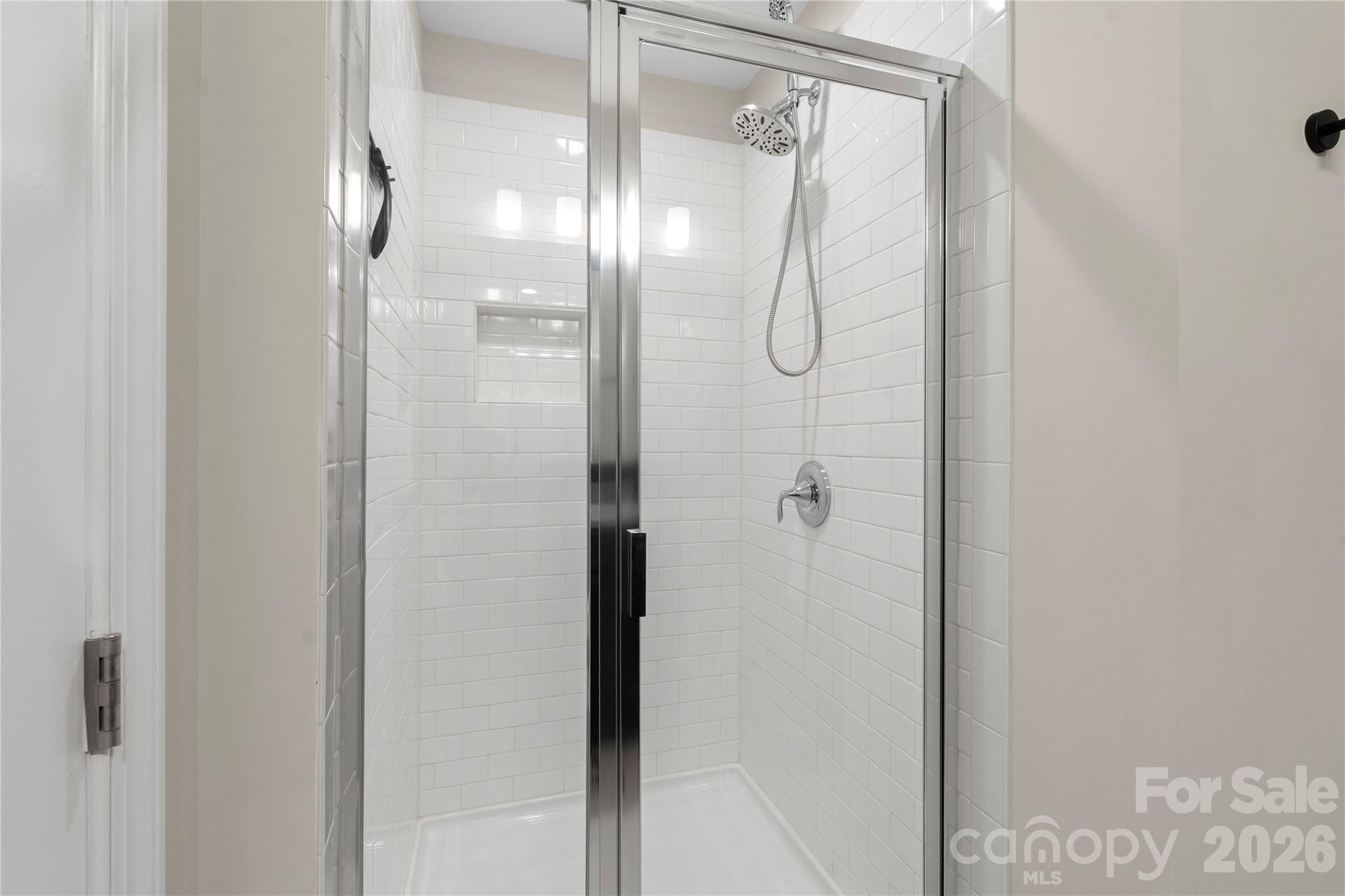 445 Sandbar Point Clover, SC 29710 - Photo 42 of 48 a bathroom with a glass shower door