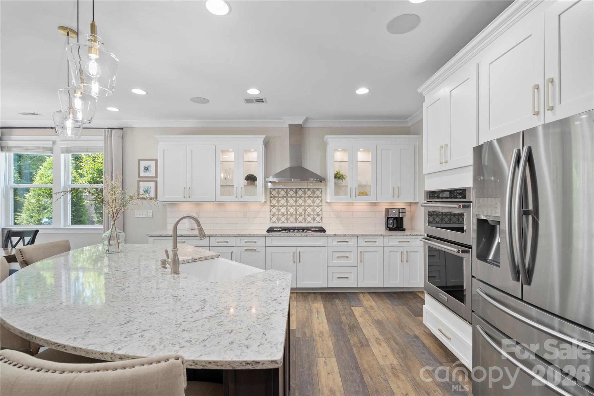 445 Sandbar Point Clover, SC 29710 - Photo 43 of 48 a kitchen with kitchen island granite countertop a stove and a sink