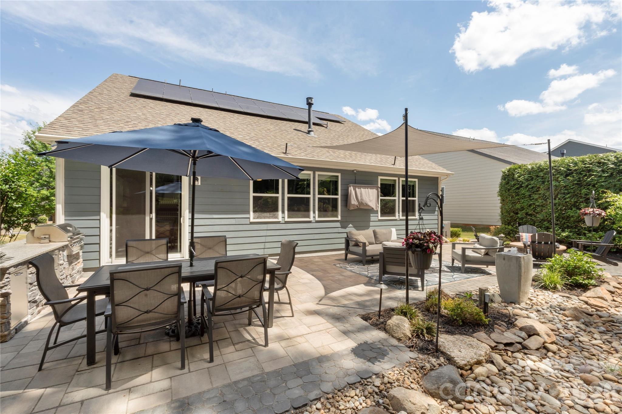 445 Sandbar Point Clover, SC 29710 - Photo 47 of 48 a view of a patio with table and chairs