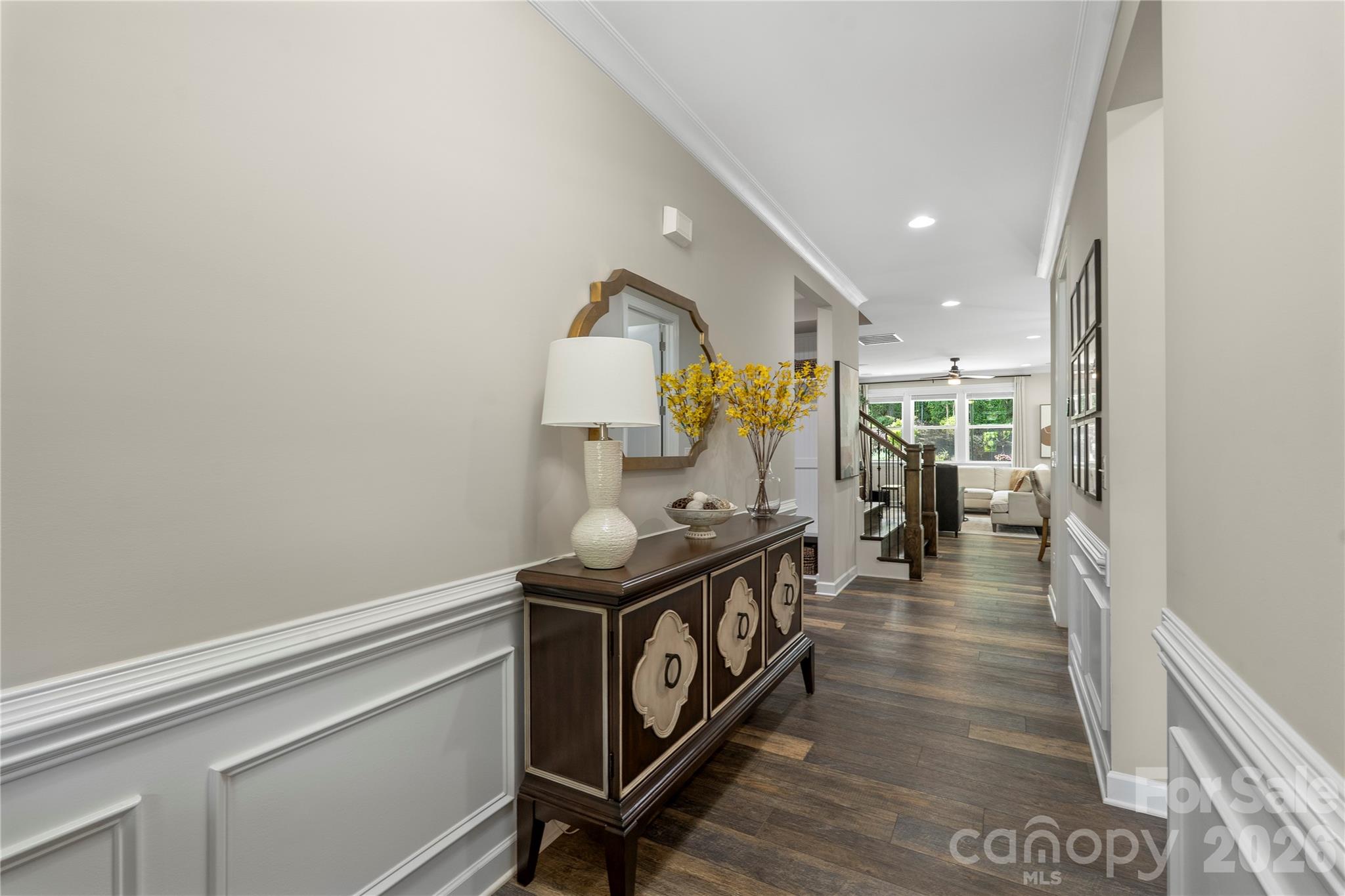 445 Sandbar Point Clover, SC 29710 - Photo 6 of 48 a hallway with a large mirror and a sink