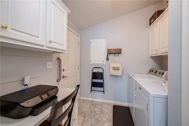 a kitchen with stainless steel appliances a stove a sink and a refrigerator