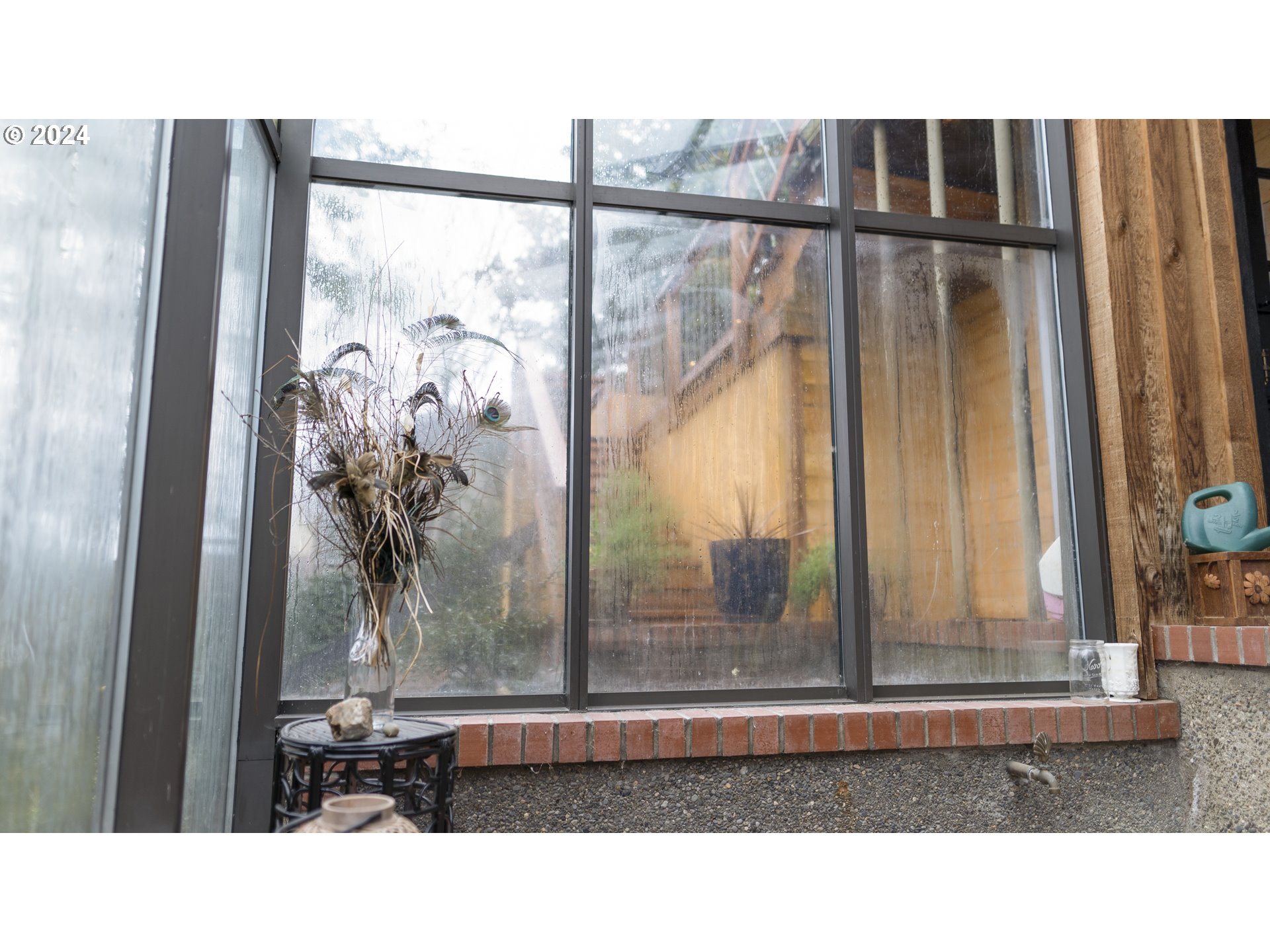 1160 North 10th Street Coos Bay, OR 97420 - Photo 28 of 42 a black and white photo of a living room