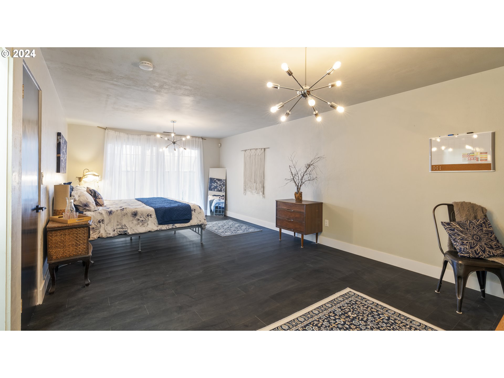 1160 North 10th Street Coos Bay, OR 97420 - Photo 35 of 42 a living room with furniture and a dining table
