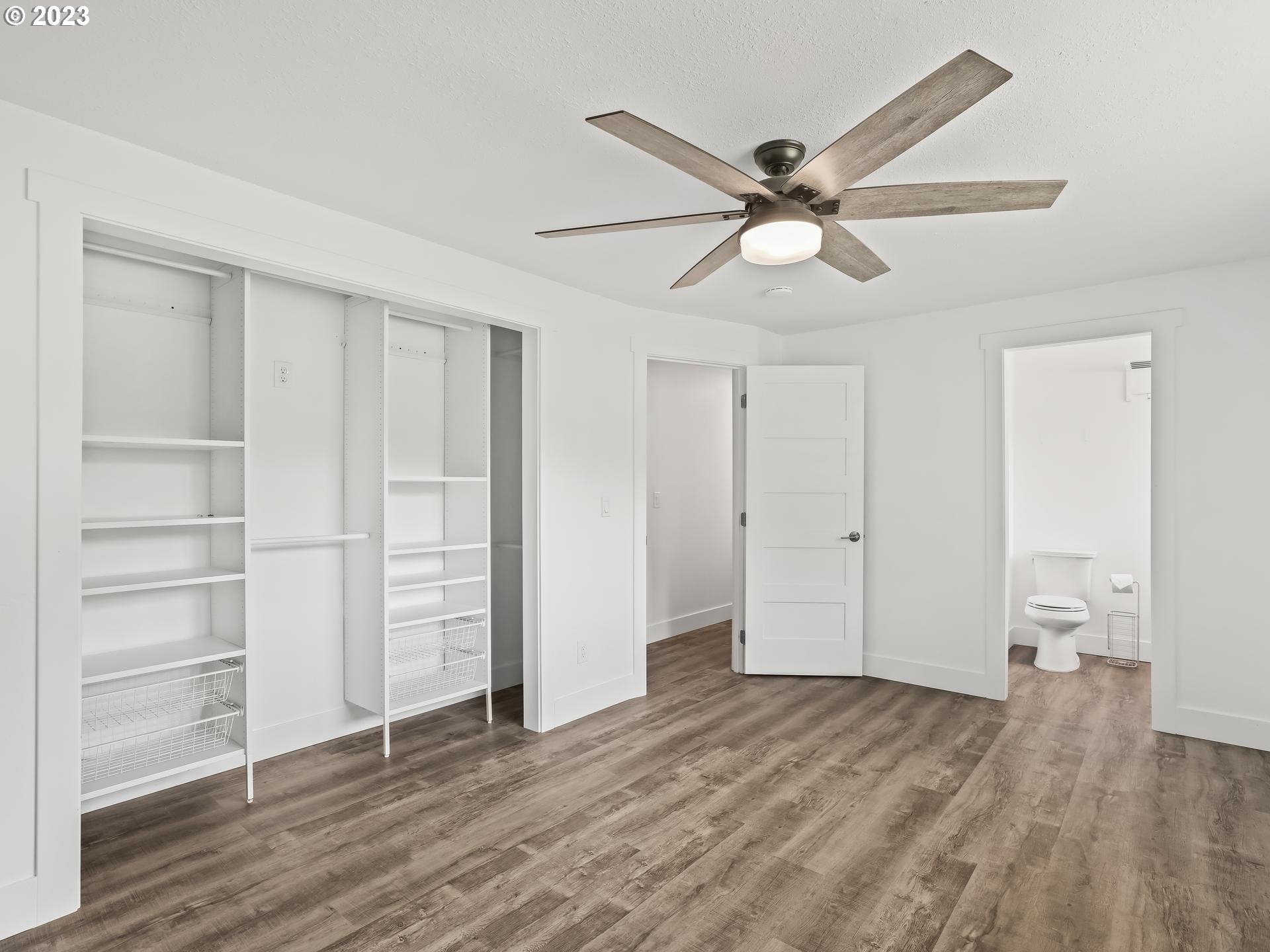 19650 Southwest Celebrity Street Beaverton, OR 97078 - Photo 23 of 47 a view of empty room with wooden floor