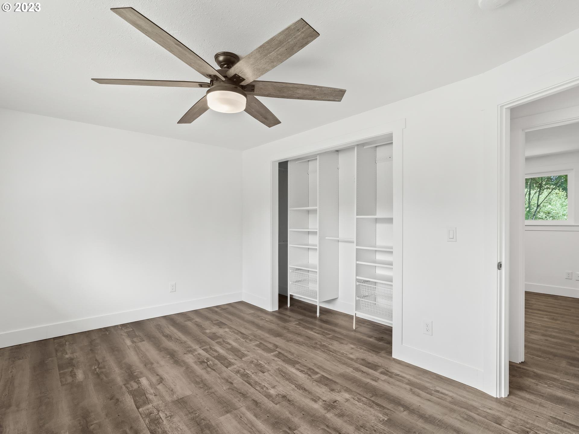 19650 Southwest Celebrity Street Beaverton, OR 97078 - Photo 25 of 47 a view of empty room with wooden floor