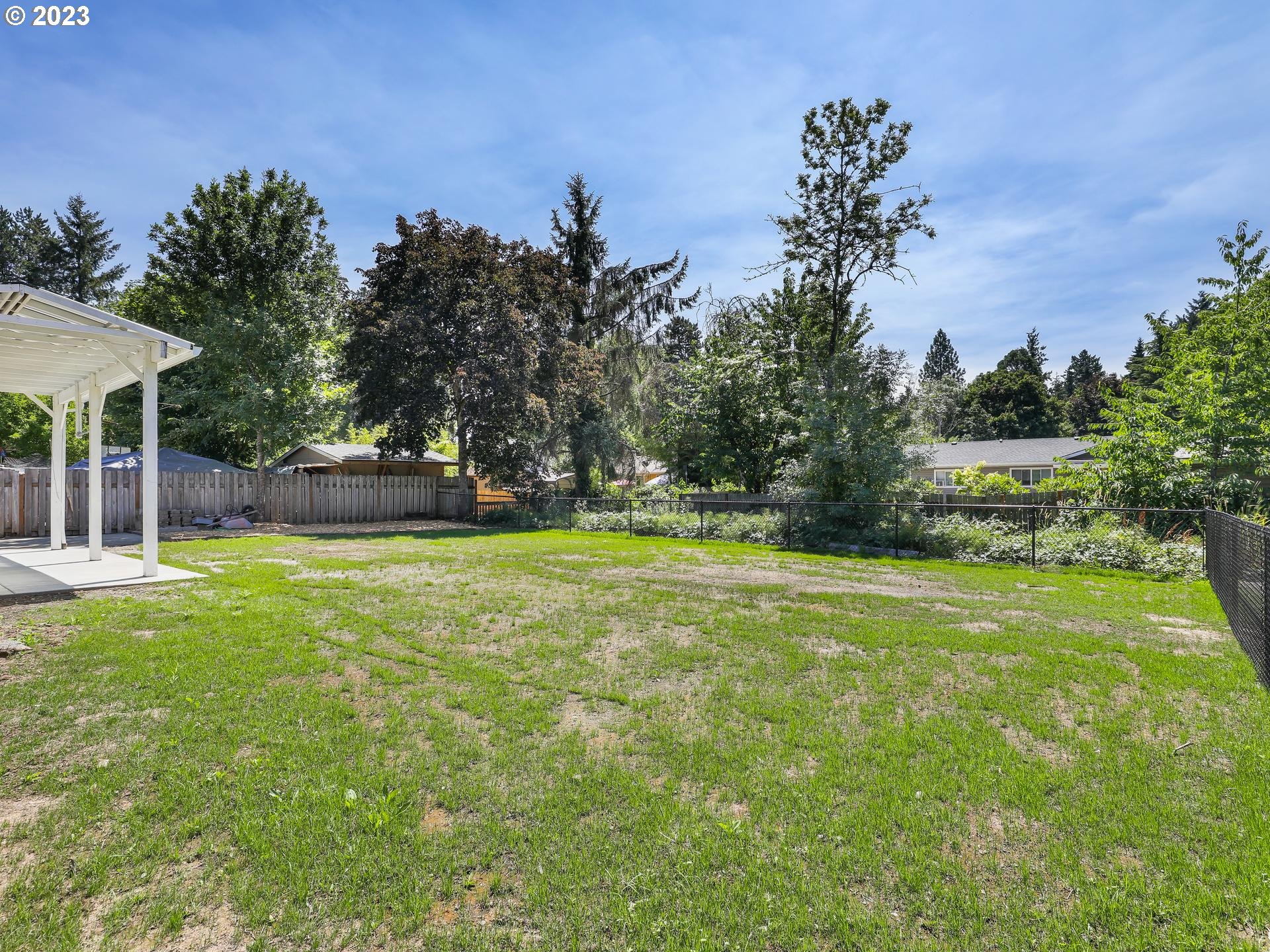 19650 Southwest Celebrity Street Beaverton, OR 97078 - Photo 36 of 47 a view of a park with large trees