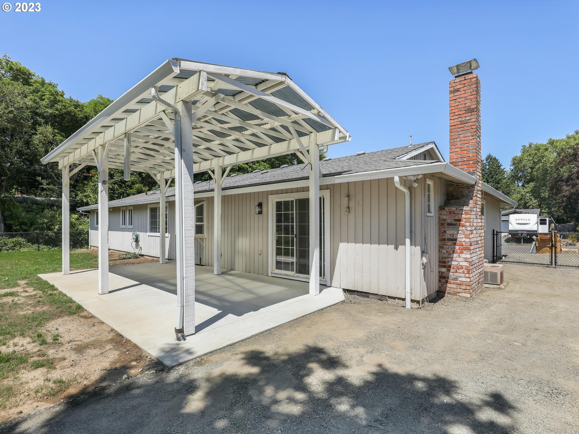 19650 Southwest Celebrity Street Beaverton, OR 97078 - Photo 43 of 47 a view of a house with backyard and roof