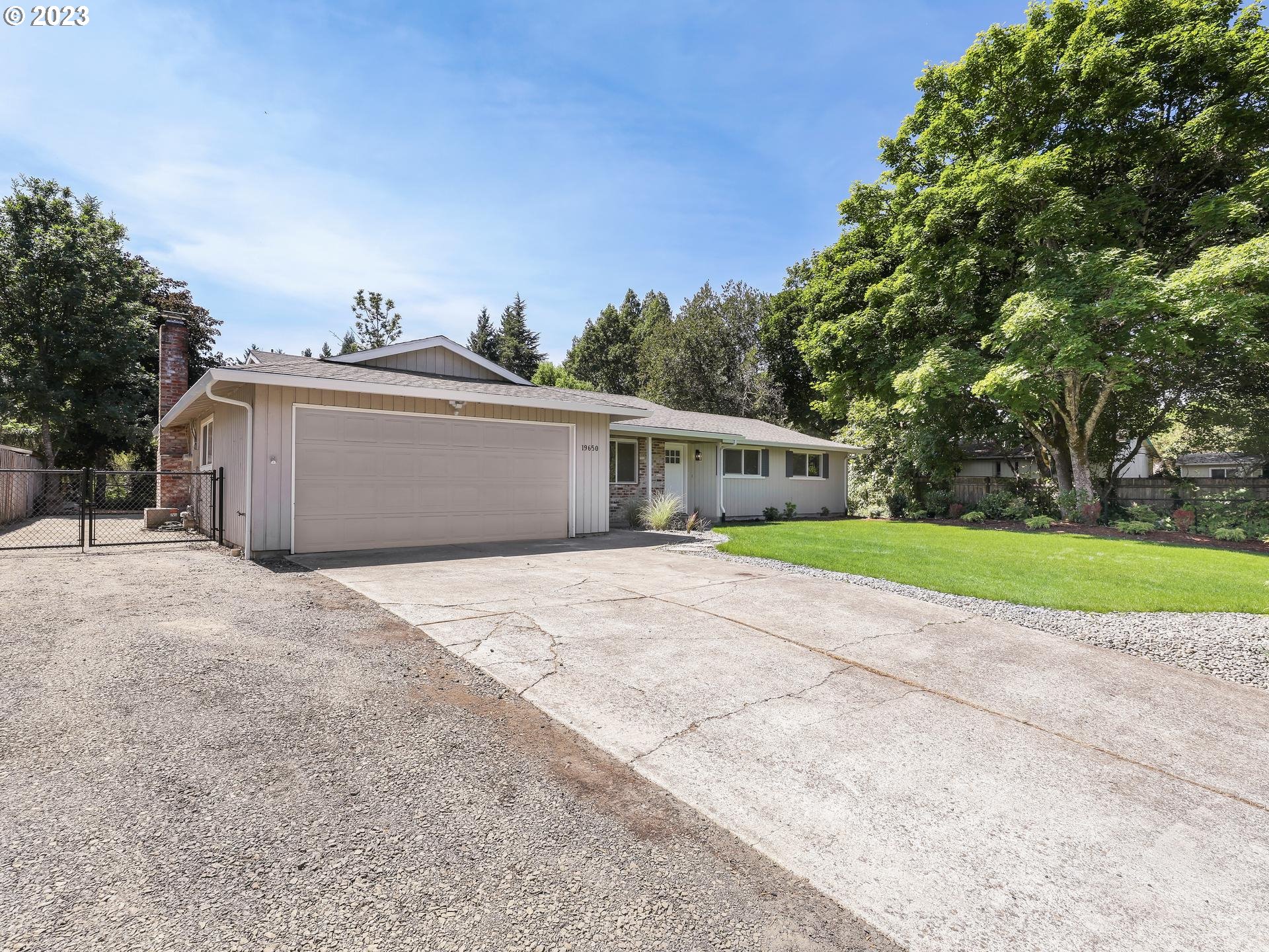19650 Southwest Celebrity Street Beaverton, OR 97078 - Photo 46 of 47 a front view of house with yard and green space