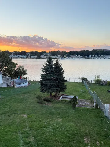 a view of a lake with a mountain in the background