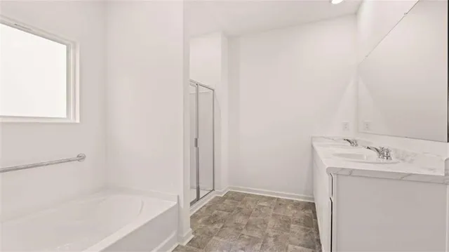 a bathroom with a sink and a bathtub