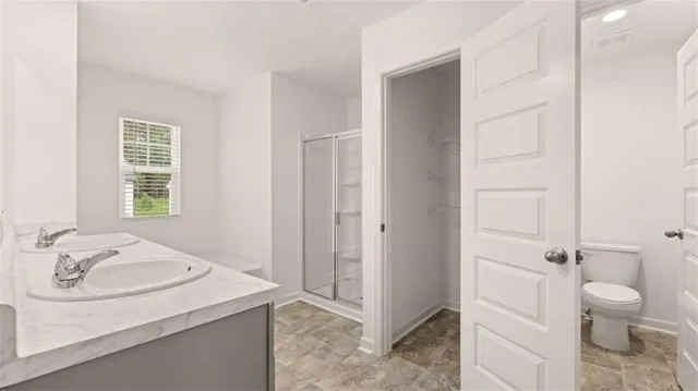 a bathroom with a sink and a toilet