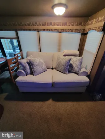 a stove top oven sitting inside of a kitchen